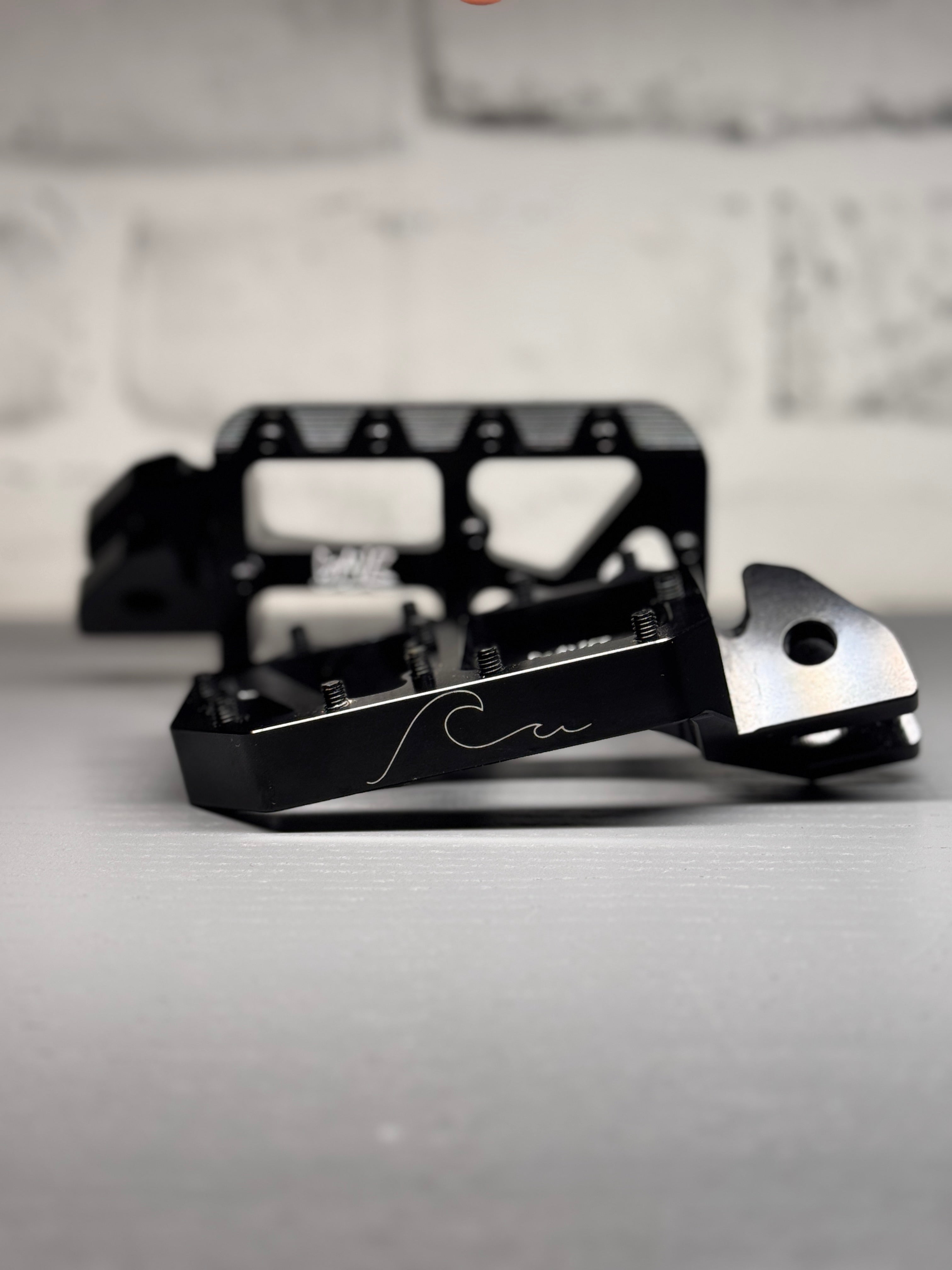 BLACK WAVE WIDE PEGS BACK ORDER