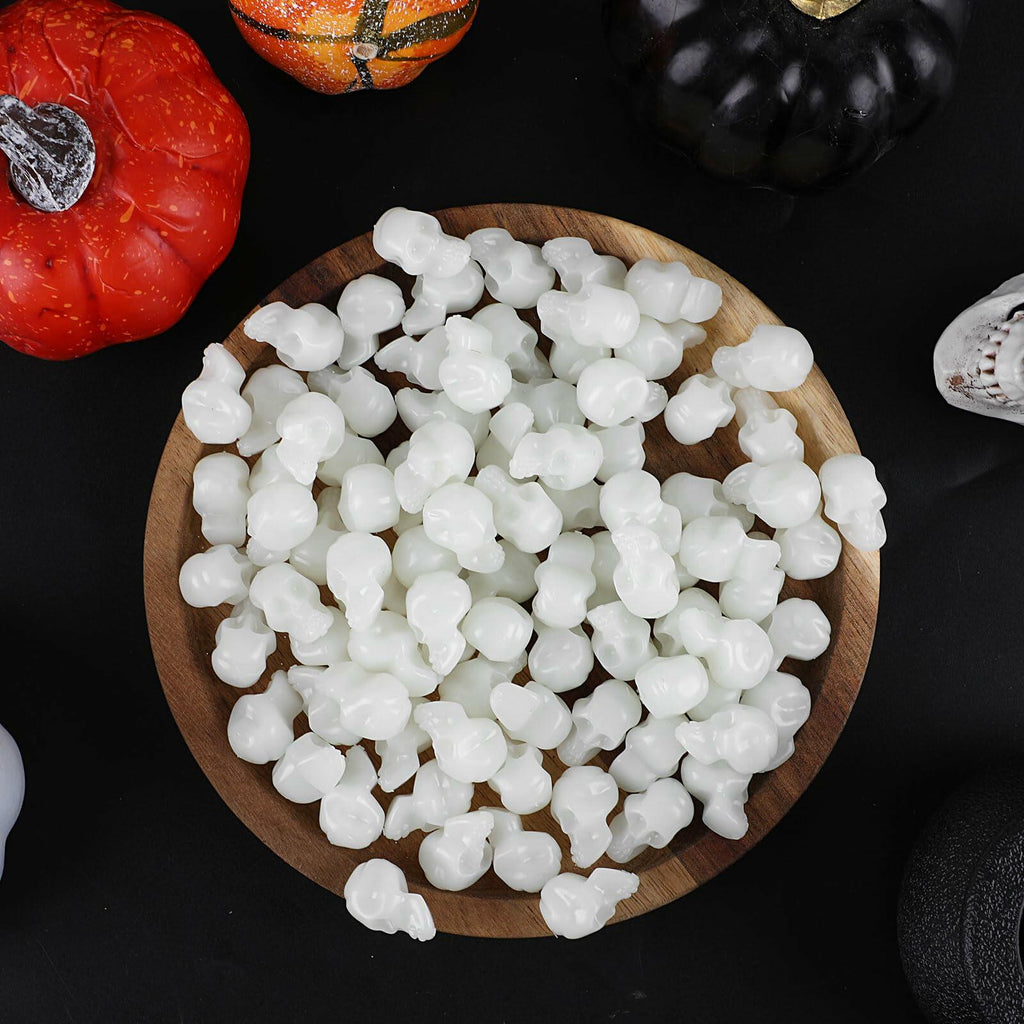 CCINEE 100PCS Glow in the Dark Mini Skull Heads Halloween Party Decor